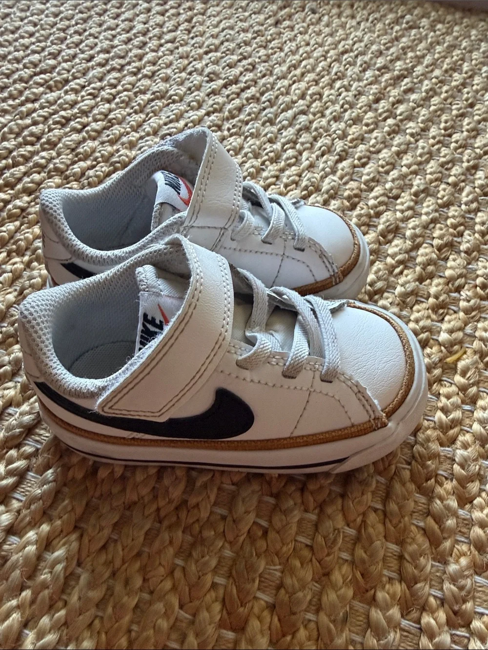 Nike Kids White Sneakers with Black Swoosh and Tan Trim